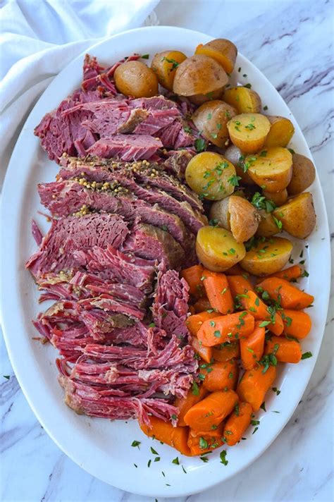 Should corned beef be covered with water in slow cooker?